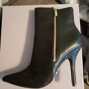 Jennifer Lopez black boots